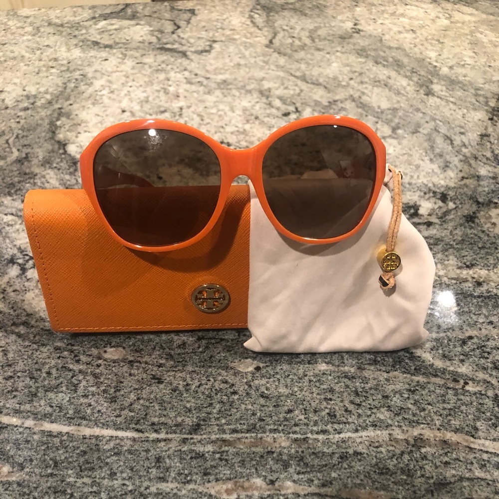- Tory Burch sunglasses.